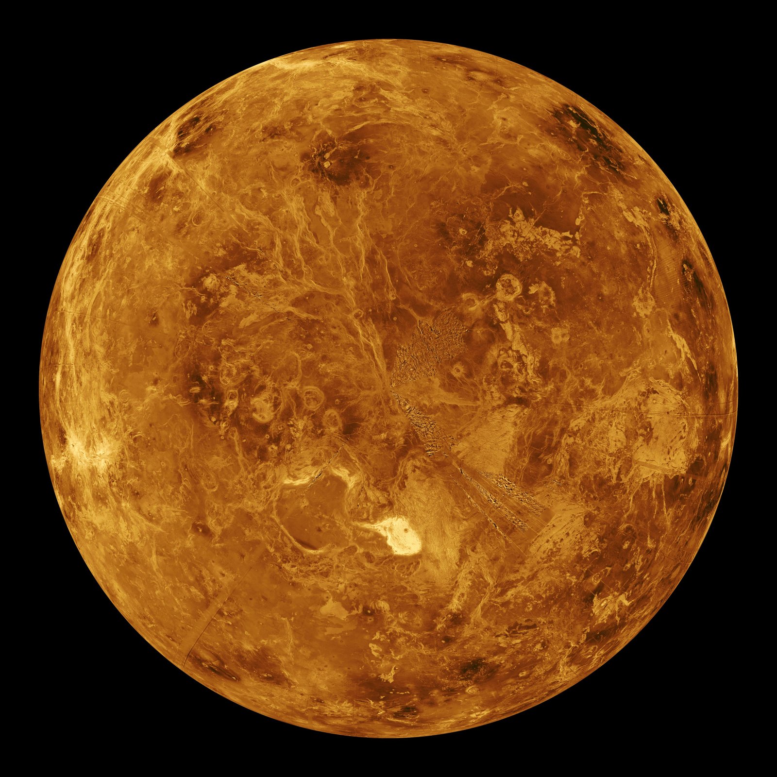 Europa: Ice over a hidden sea. The smoothest large solid in the solar system. Almost no mountains. A script of cracks.